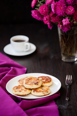 Delicious homemade cheese pancakes with black coffee