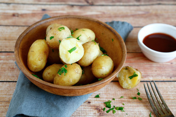 Boiled potatoes in a clay bowl