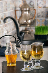 Two cups of tea in the kitchen interior