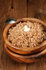Russian buckwheat kasha in wooden bowl