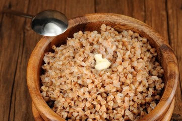 Russian buckwheat kasha in wooden bowl