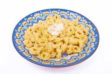 Ravioli dish on a white background