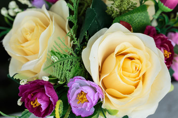 close up flowers made from fabric on table