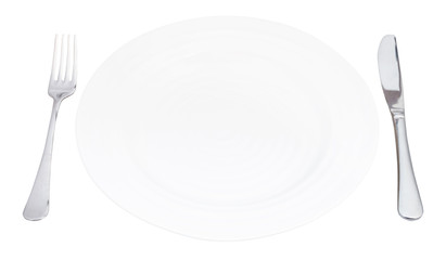 empty white plate with fork and knife isolated