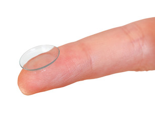 contact lens on finger close up isolated