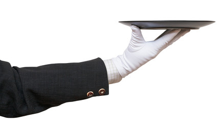 side view of arm in white glove with black plate