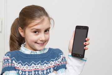 Little girl using mobile phone