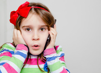 Little girl using phone