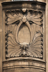 Fototapeta na wymiar Floral ornamental decoration on the Art Nouveau building