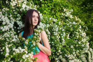 beautiful girl near flowers