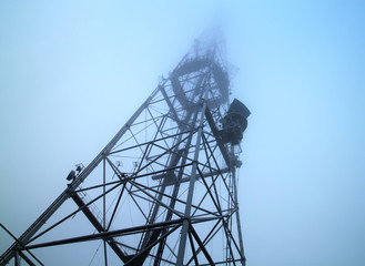 Telecommunication mast with microwave link and TV transmitter an