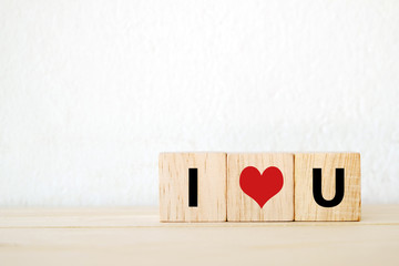 Three wood cubes with " I love you " words