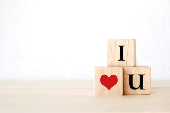 Three wood cubes with " I love you " words