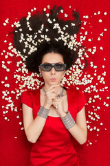 Fototapeta premium Surprised Girl with 3D Cinema Glasses and Popcorn Seeing a Movie