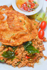 Fried pork with sweet basil and omelette