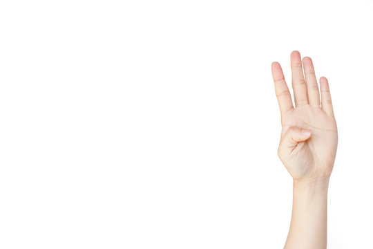 Japanese hand gesture: Number four on isolated white background