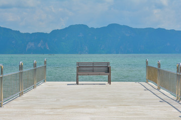 one wooden chair on dock
