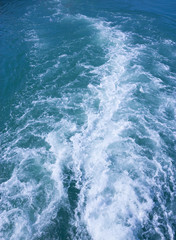 Fototapeta na wymiar Foam water from boat propellers