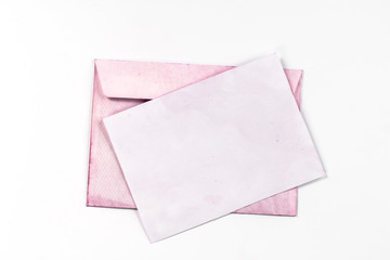 isolated pink paper page and open envelope