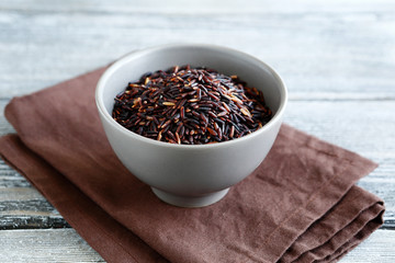 Black wild rice in a clay bowl