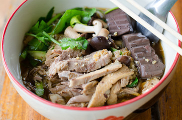 noodles with pot-stewed duck in bowl