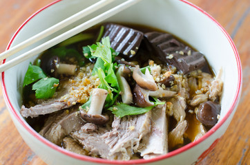 noodles with pot-stewed duck in bowl