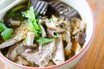 noodles with pot-stewed duck in bowl
