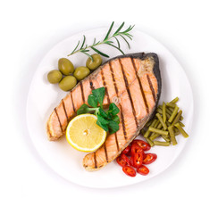 White plate of salmon steak