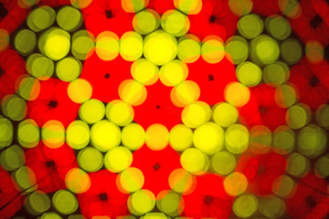 Kaleidoscope. Blurred defocused lights background.