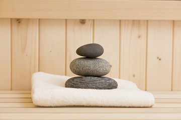 Obraz na płótnie Canvas relax in sauna, zen stones and spa