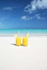 Orange juice on the beach. Great Exuma, Bahamas