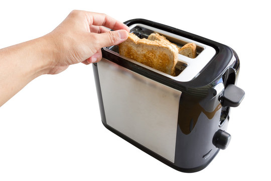 Hand pick bread from toaster