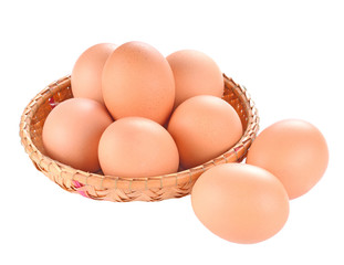 eggs in basket on white background
