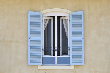 Window with louvre doors