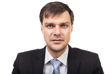 Portrait of a young handsome businessman isolated