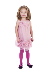 Full length portrait of an adorable little girl with pink dress