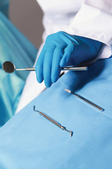At the dentist&#39;s, focus on medical tools lying on the table