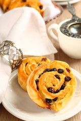 Fresh gluten free sweet swirl buns with raisins