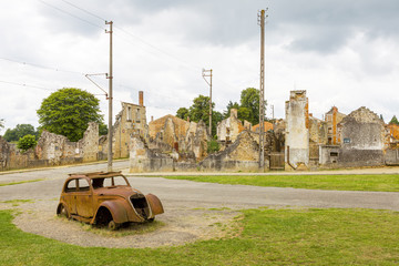 A rusty motorcar in Oradour-sur-Glane