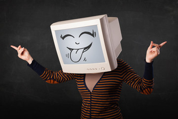 Young girl wearing a monitor with a funny face