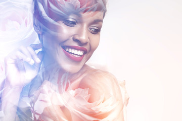 Double exposure of happy smiling woman and roses