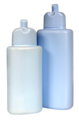 colored plastic bottles with liquid soap and shower gel.