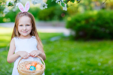 Little girl with Easter eggs