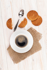 Coffee cup, gingerbread cookies and spoon