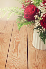 Background with rose flower bouquet close up