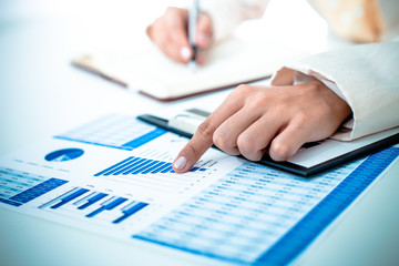 Business people discussing the charts and graphs showing the res