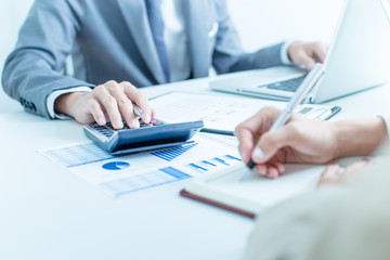 Business people discussing the charts and graphs showing the res