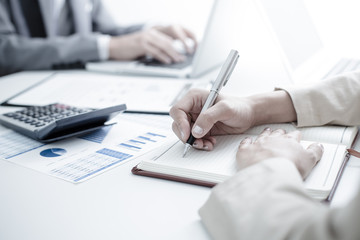 Business people discussing the charts and graphs showing the res