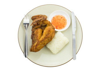 sticky rice with fried chicken , isolated on white background