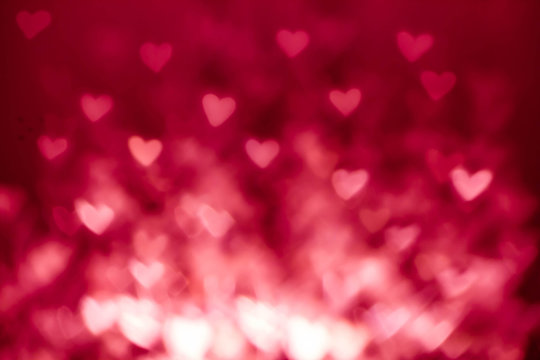 Abstract Valentine's day background with red hearts. Colorful So